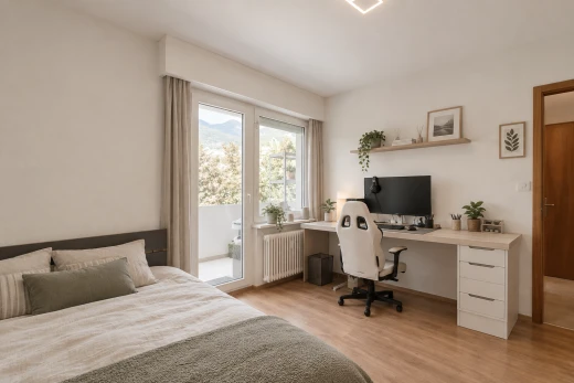 chambre avec drywall, cloison sèche, radiateur, télévision, et wood finish floor