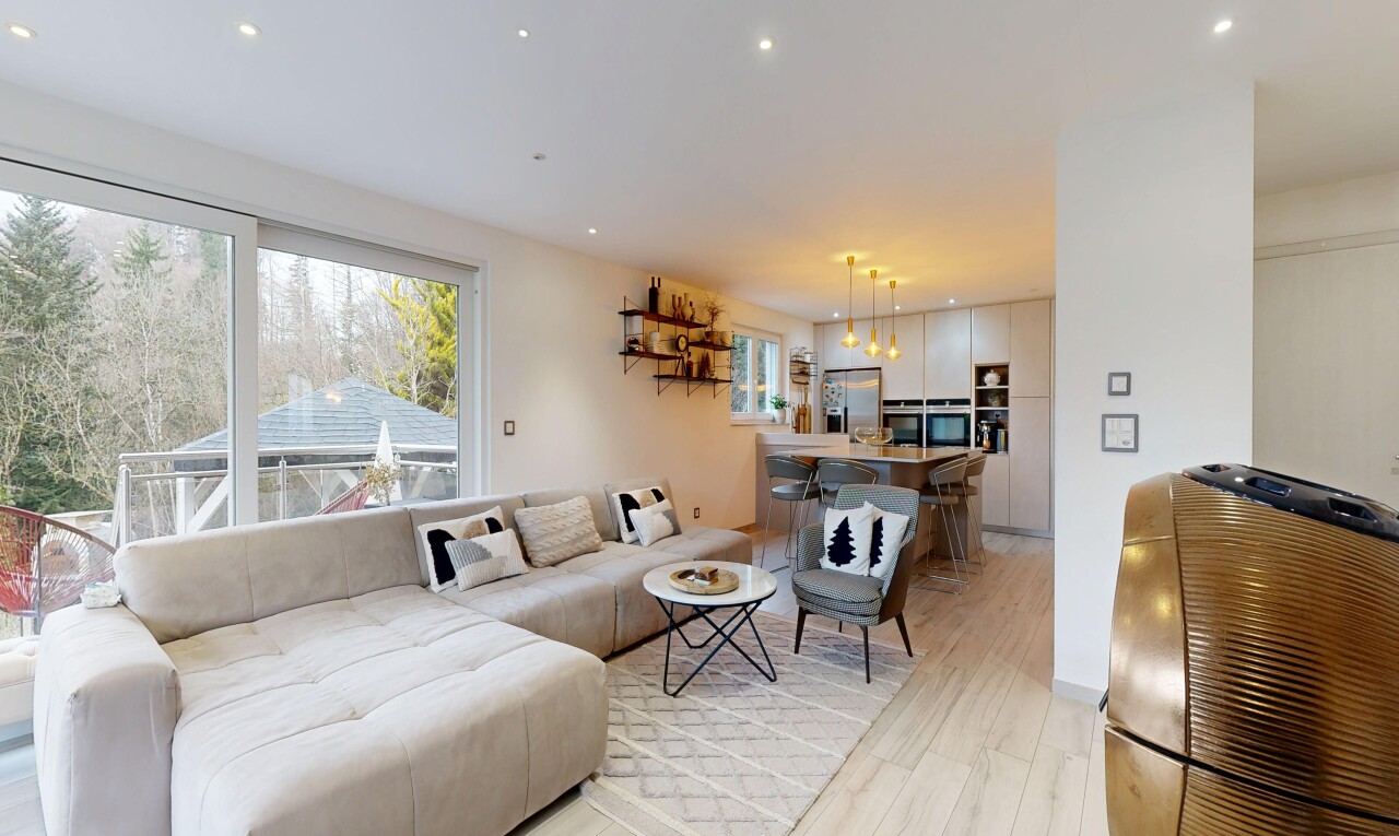 living area featuring recessed lighting and light wood-style flooring