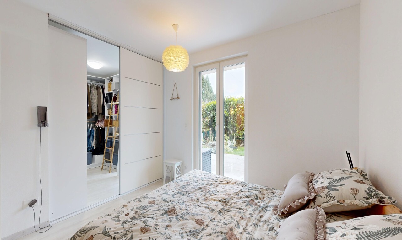 room featuring access to exterior and a closet