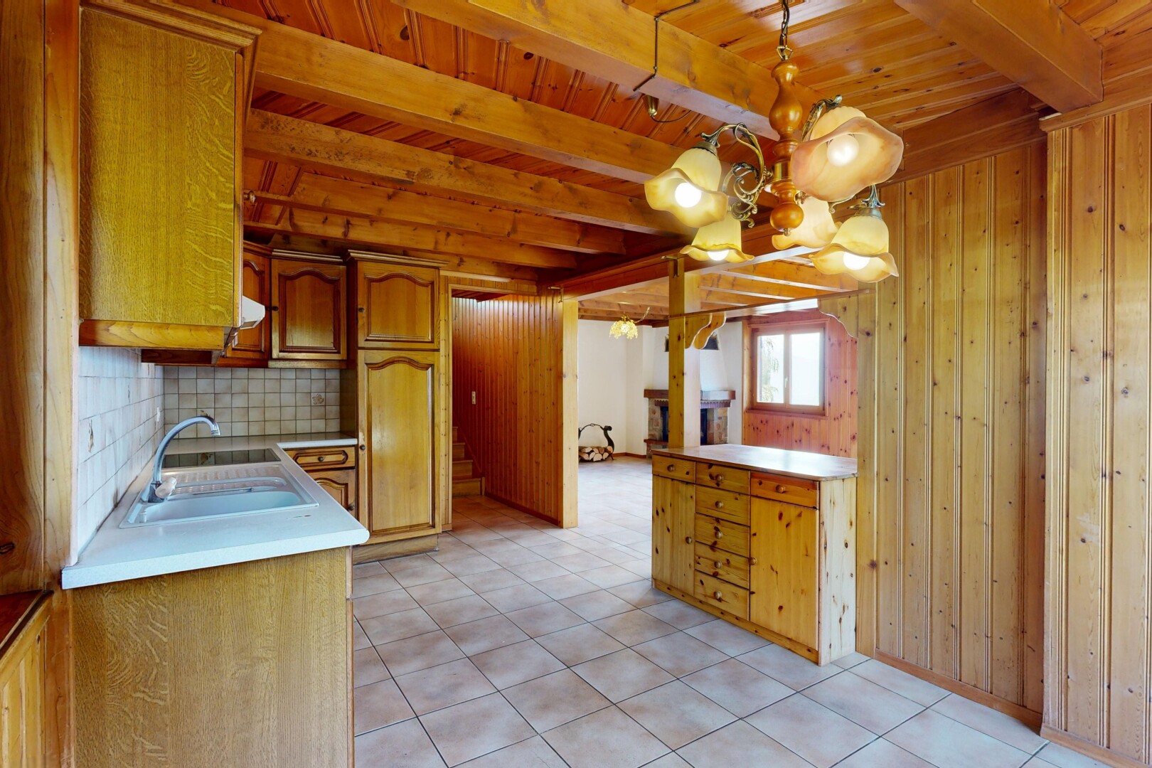 küche mit bogenförmige schränke, arched cabinets, dated wood wall, arbeitsplatten, und light countertops