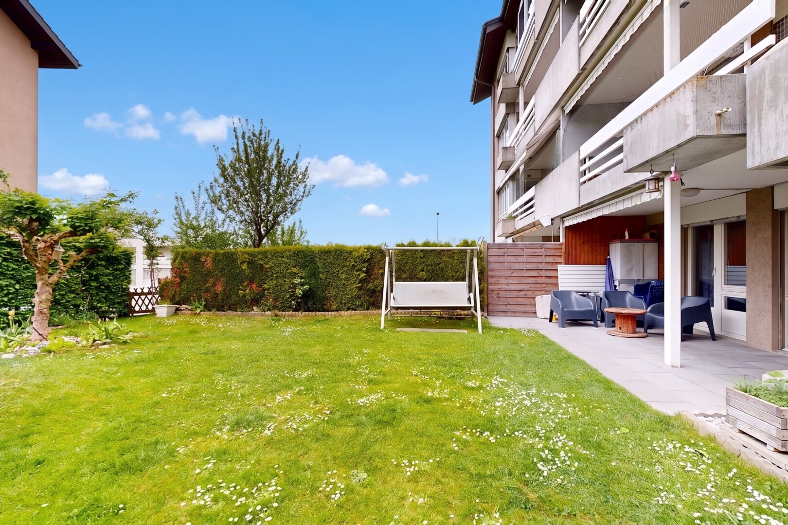 garden featuring a fenced backyard and a patio