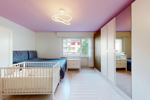 zimmer / schlafzimmer mit inside property, kühler, gipskartonwand, drywall, und natürliches licht