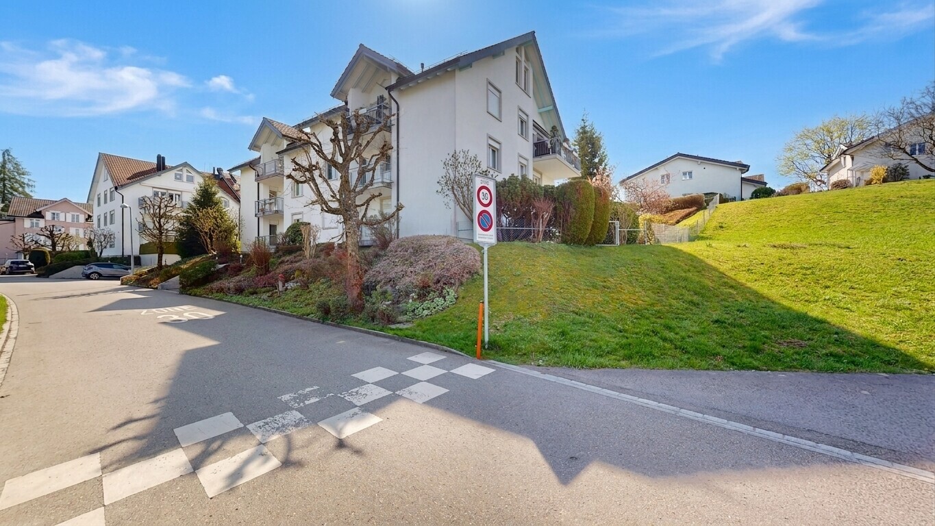 außenansicht mit day time, rasen, stuckverkleidung, wohngebietblick, und residential view