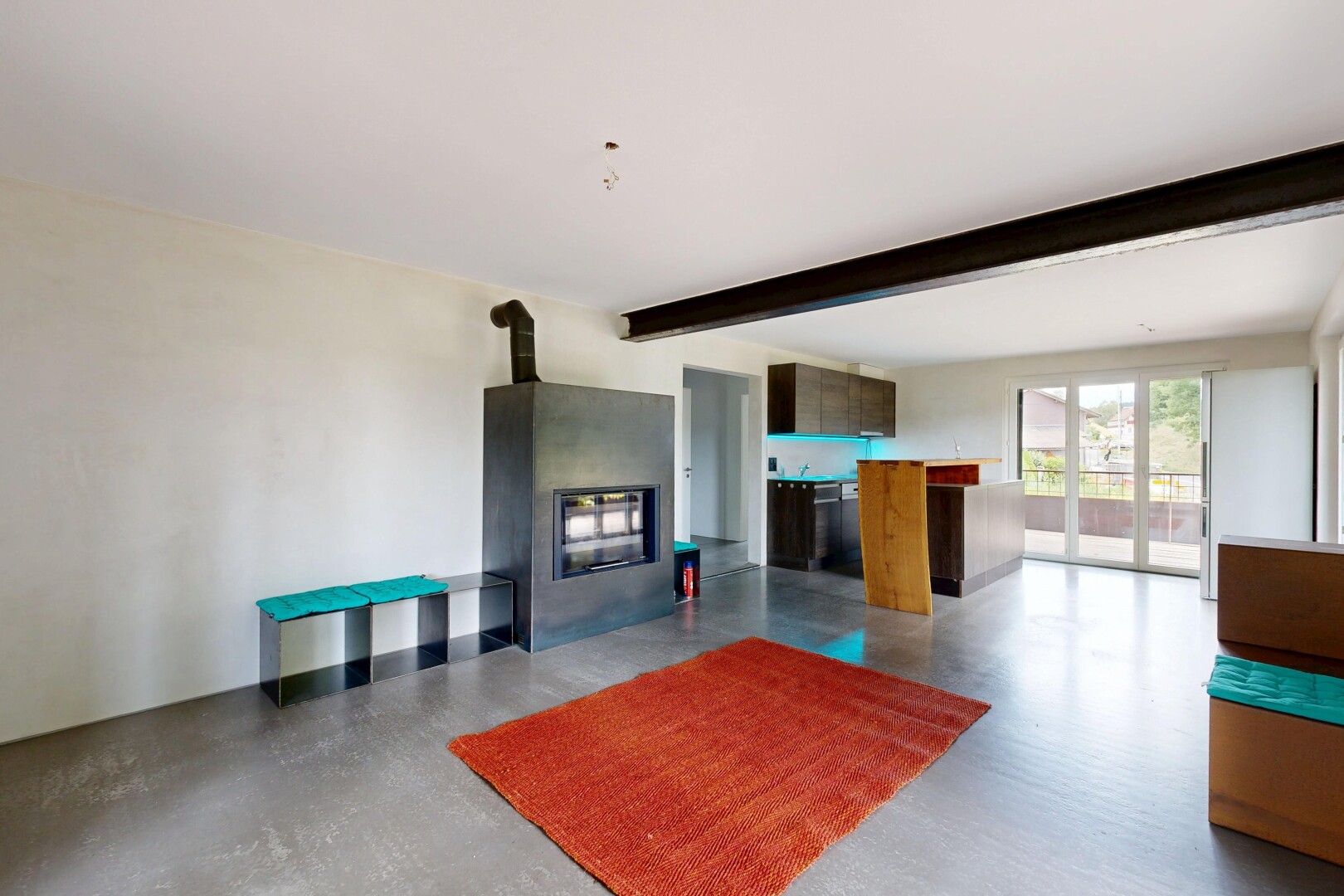 welcome area / lobby with beam ceiling