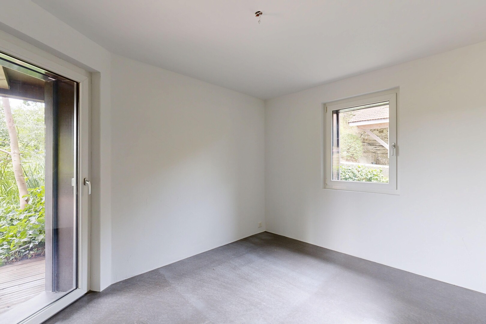 empty room featuring light colored carpet
