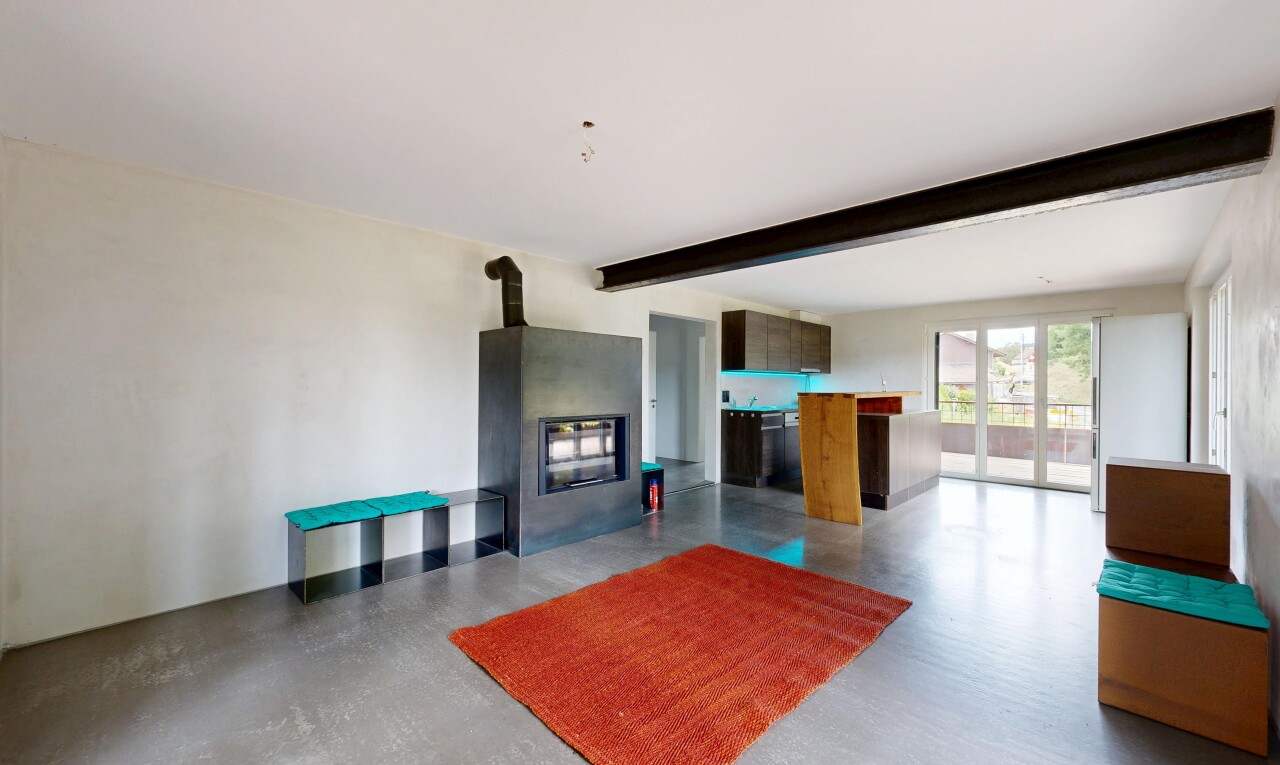welcome area / lobby with beam ceiling