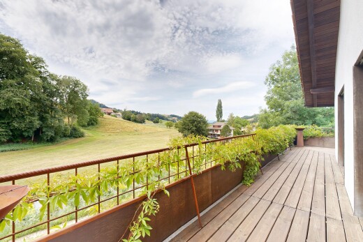 view of wooden balcony featuring a wooden deck