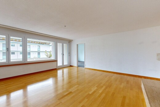 leerer raum mit inside property, natürliches licht, natural light, holzfußboden, und wood finish floor