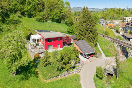 outdoor house with ground mounted solar panels