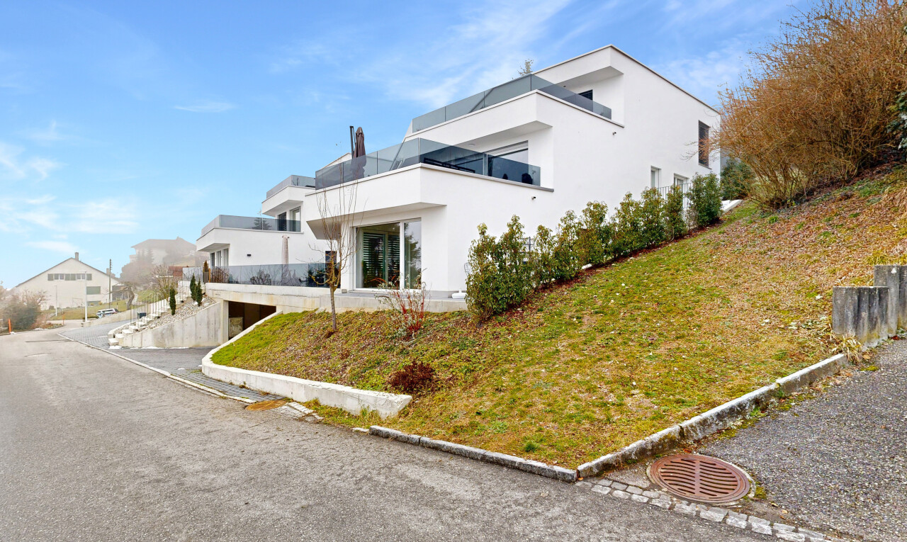 façade avec day time, property visible, et bardage en stuc