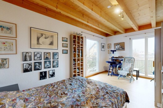 zimmer / schlafzimmer mit inside property, außenzugang, balkendecke, beamed ceiling, und natürliches licht