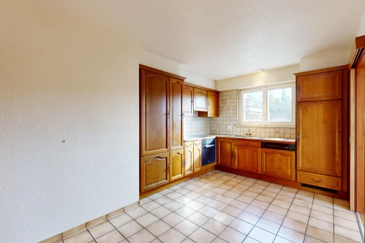 küche mit arched cabinets, bogenförmige schränke, light floor, medium brown cabinets, und mittelbraune schränke