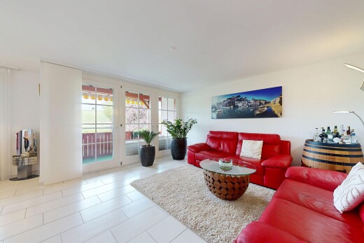 living area featuring light tile patterned floors