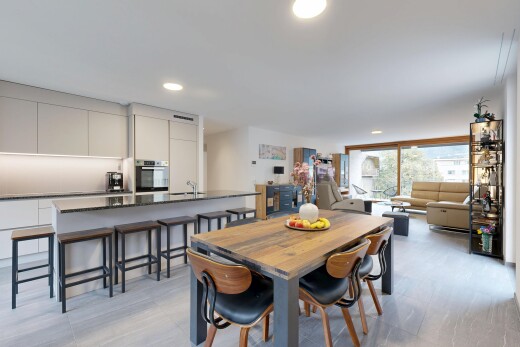 dining room featuring recessed lighting and a sink