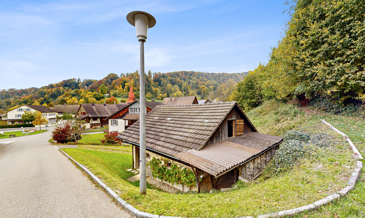 outdoor house featuring a lawn