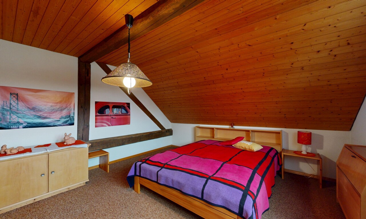 room featuring wooden ceiling and carpet