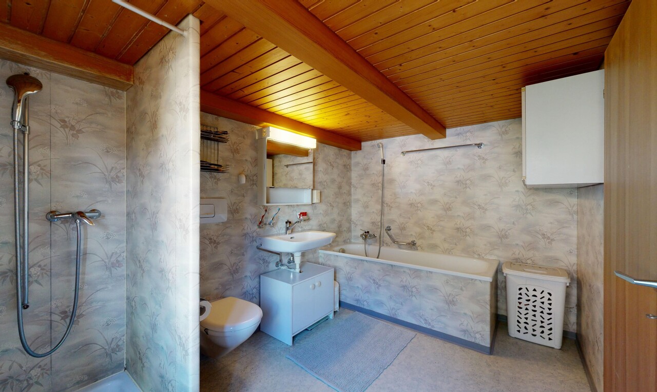 full bathroom featuring a wood ceiling with exposed beams, a shower, and a tub to relax in