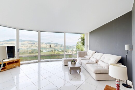 wohnzimmer mit floor ceiling windows, view focus, fernseher, drywall, und gipskartonwand