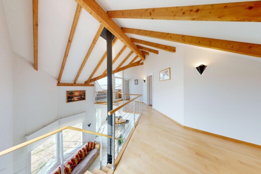 stairs featuring wood finished floors and baseboards