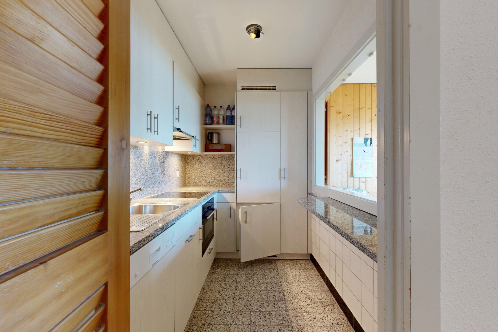 kitchen with open shelves, decorative backsplash, black appliances, light stone countertops, and white cabinetry