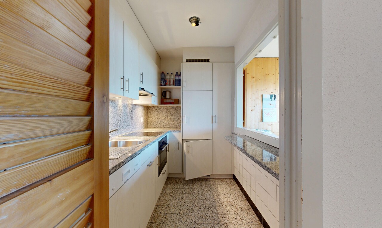 kitchen with open shelves, decorative backsplash, black appliances, light stone countertops, and white cabinetry