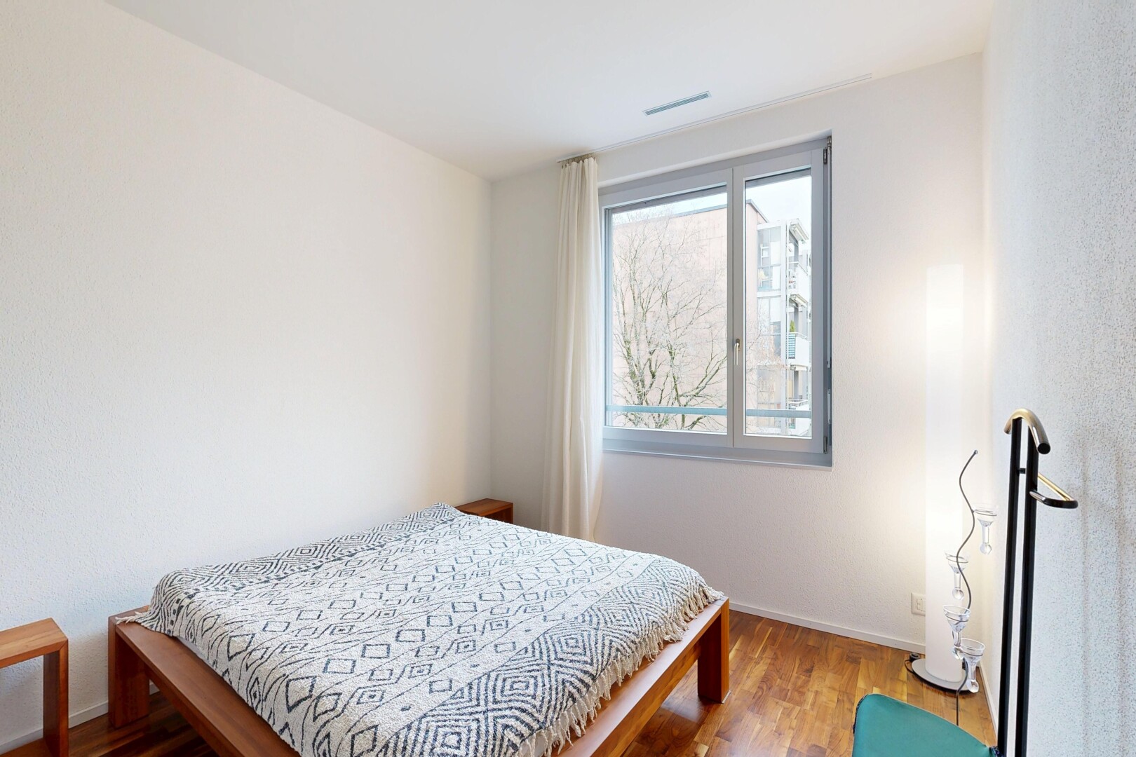 room with wood finished floors and baseboards