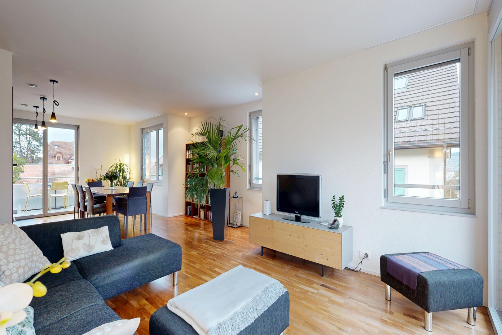 living / dining area featuring wood finished floors