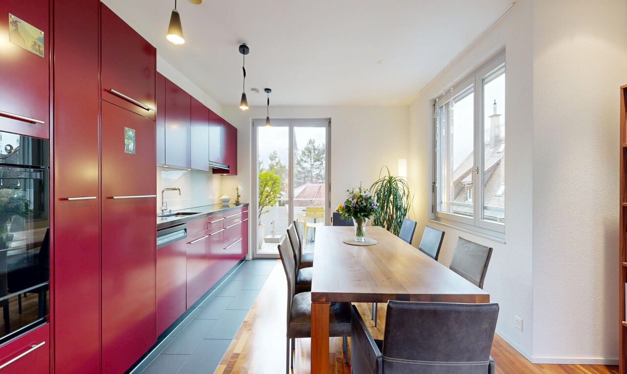 dining space featuring a sink and light wood-style flooring