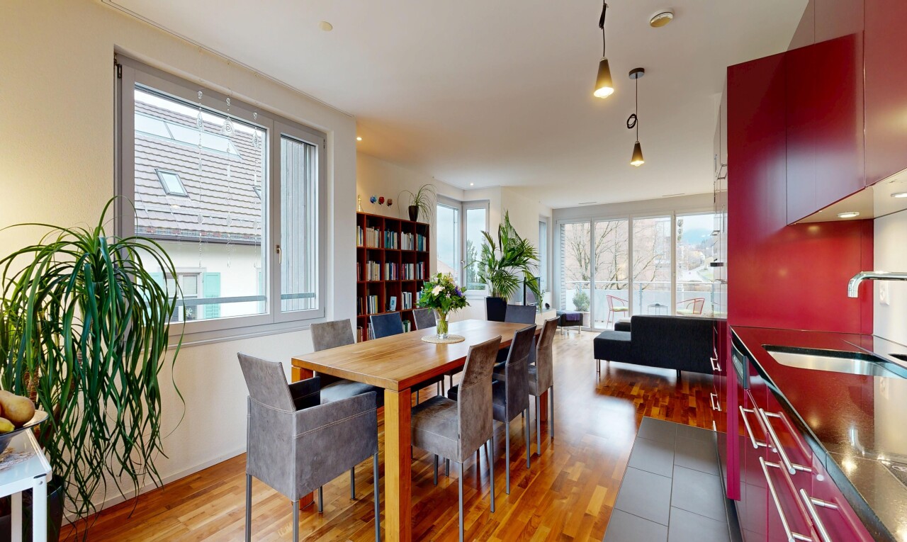 dining room featuring dark wood-type flooring and healthy amount of natural light