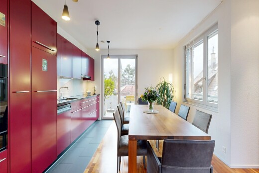 dining space featuring a sink and light wood-style flooring