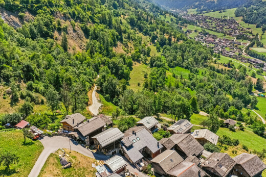 view of mountain background featuring nearby suburban area