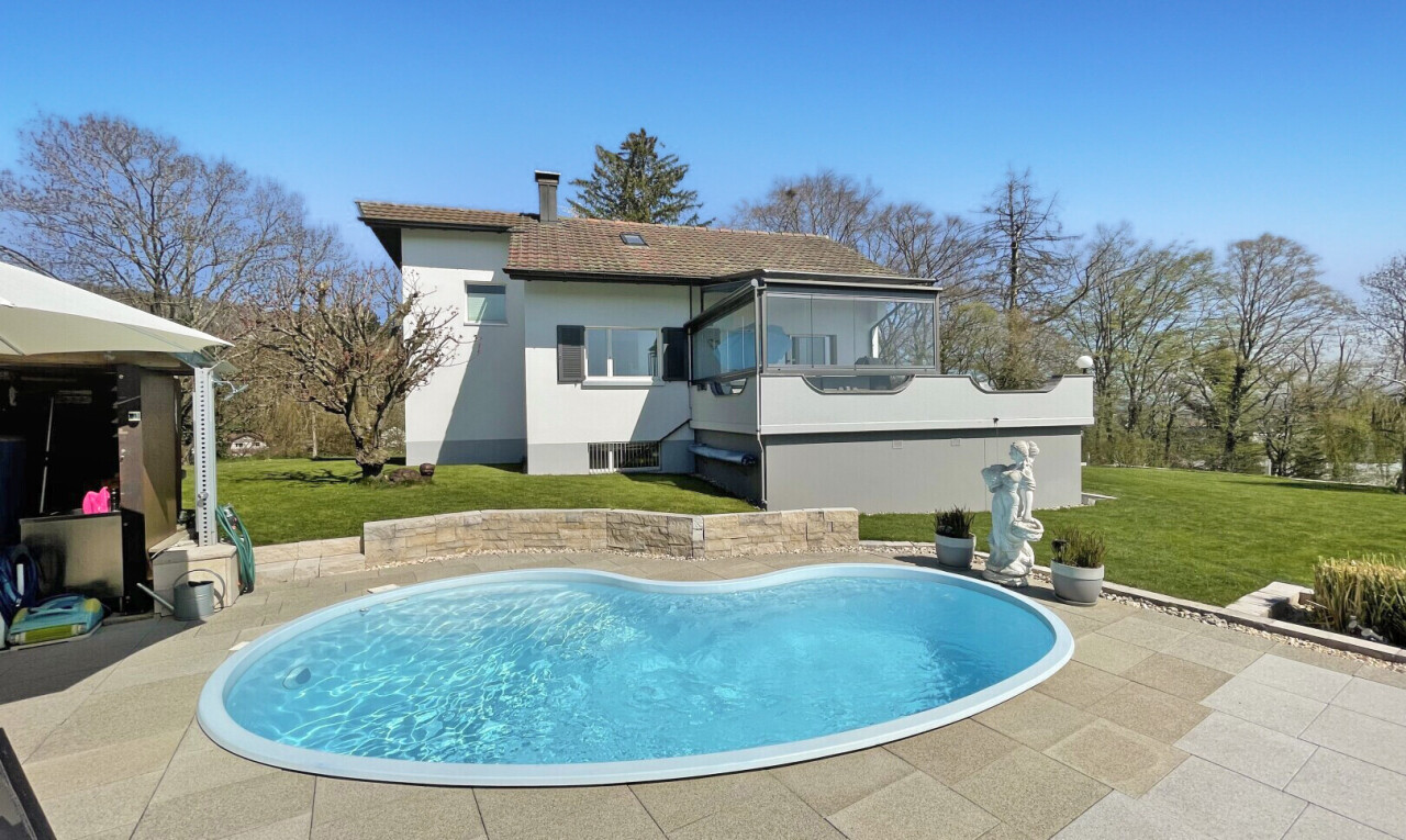 schwimmbad mit rasen, day time, schwimmbad, terrasse, und property visible