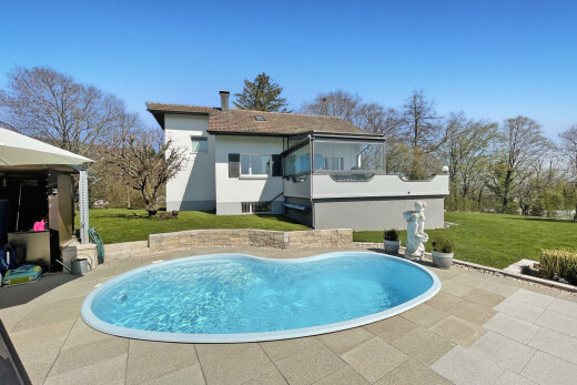 schwimmbad mit rasen, day time, schwimmbad, terrasse, und property visible