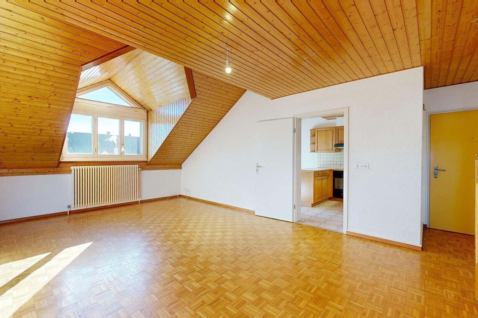 dining space with wooden ceiling, radiator heating unit, and parquet flooring