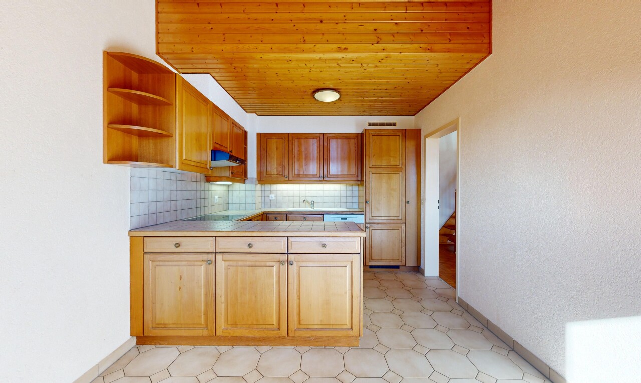 kitchen with decorative backsplash, open shelves, a peninsula, tile counters, and wood ceiling