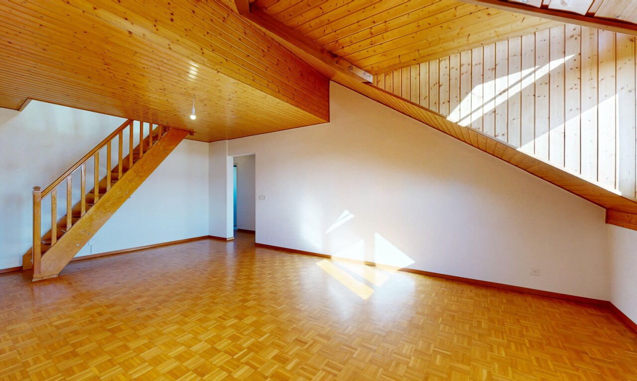 spare room featuring a high wood ceiling and parquet floors