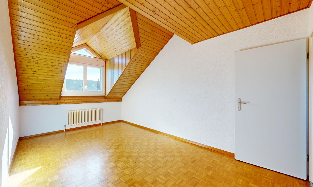 unfurnished room featuring wooden ceiling, parquet floors, and radiator