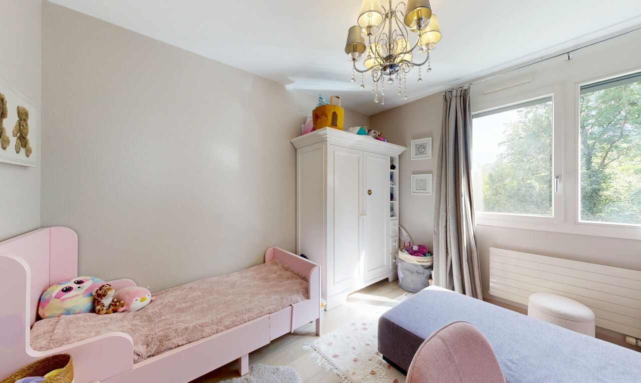room featuring a chandelier