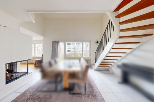 dining area featuring stairs and light tile patterned floors