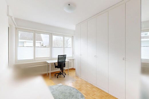 office featuring radiator and parquet flooring