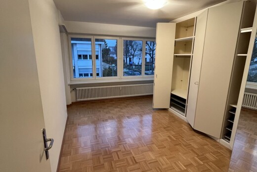 spare room with radiator and parquet floors