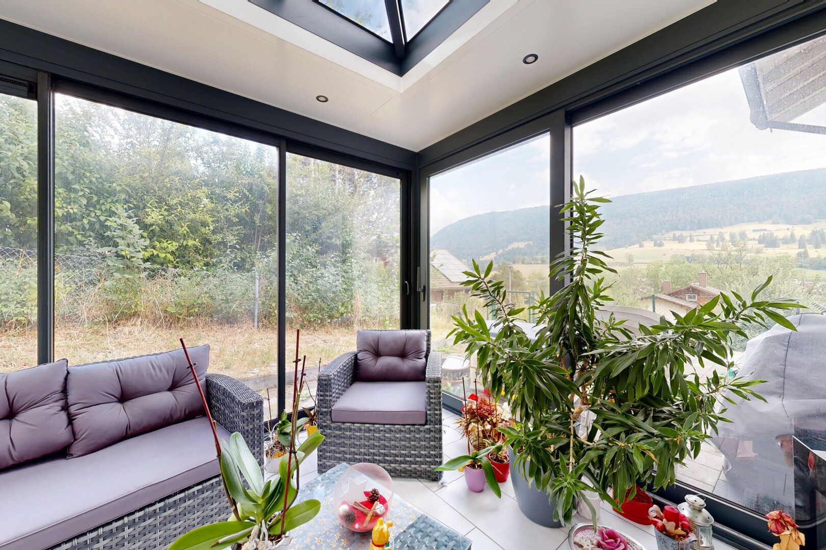 wohnzimmer mit wintergarten und view focus