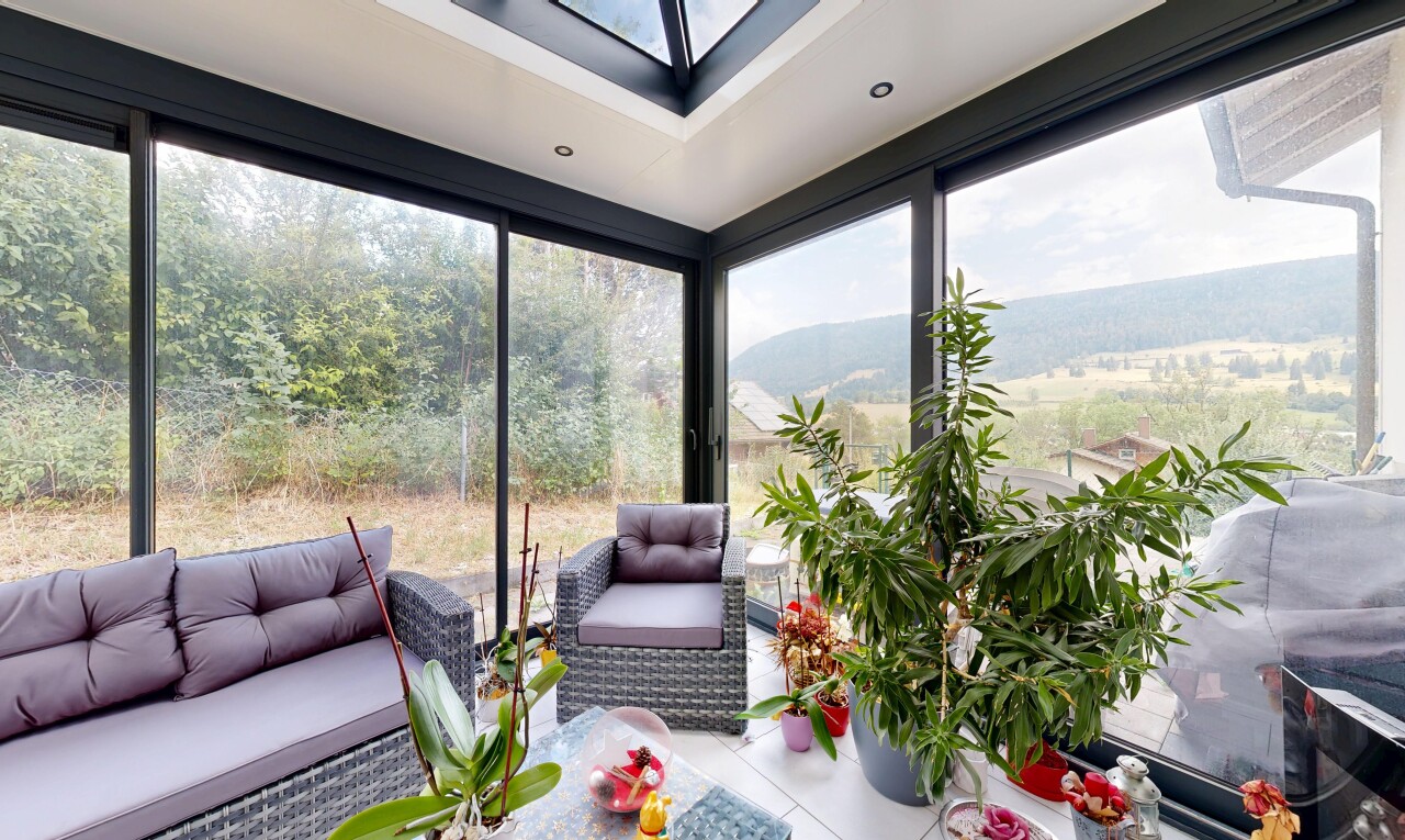 wohnzimmer mit wintergarten und view focus