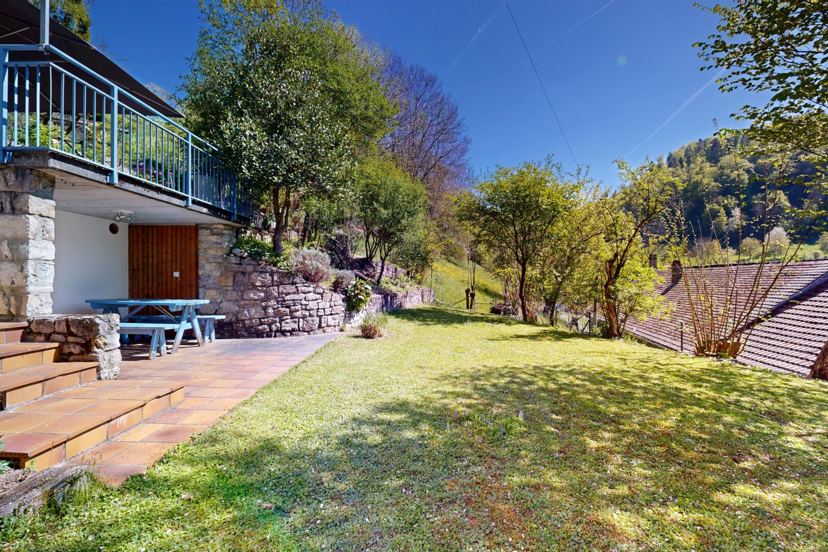 garden featuring a patio and a yard