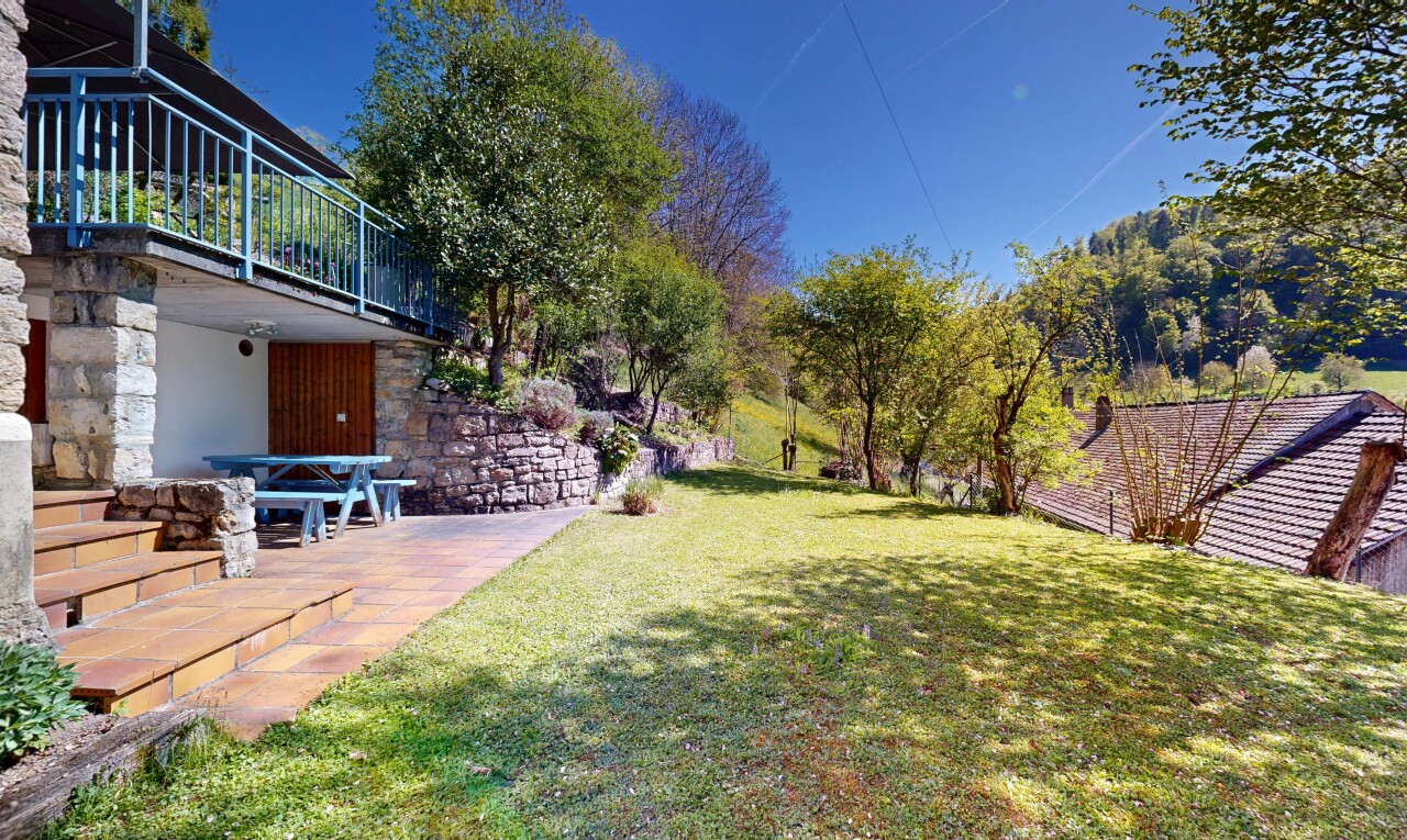garden featuring a patio and a yard