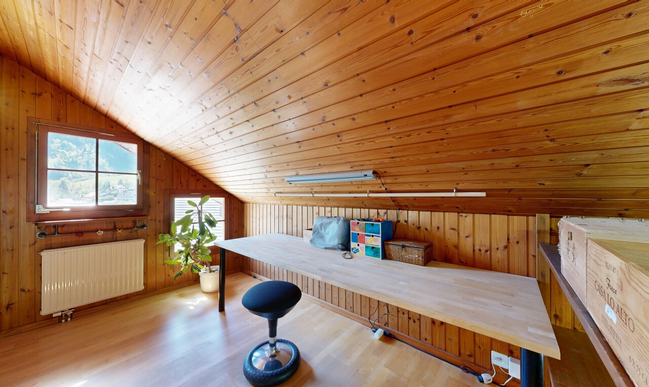 interior space featuring wooden walls, a vaulted wood ceiling, radiator heating unit, and wood finished floors