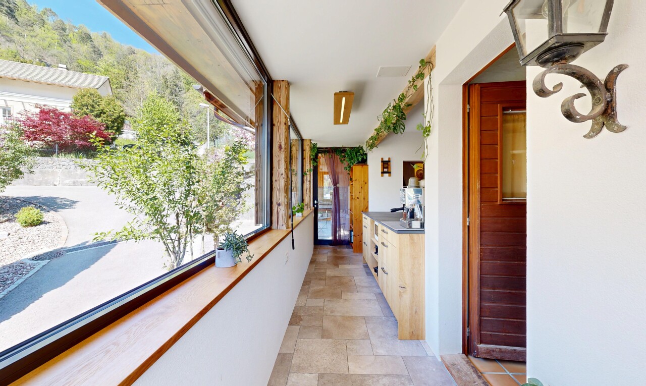 corridor with stone finish flooring