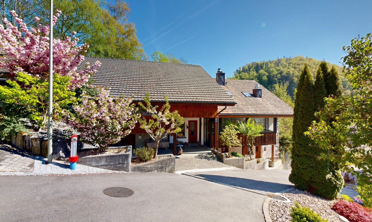 view of property featuring a chimney
