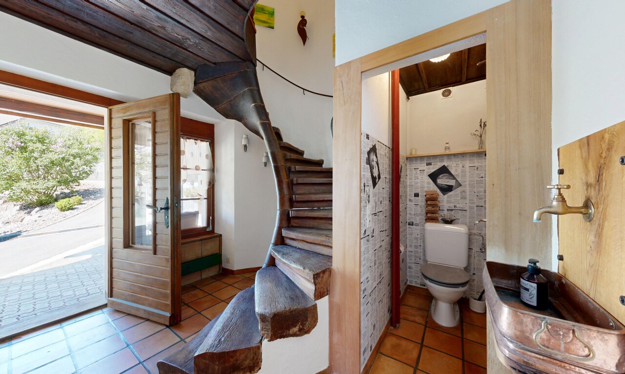 stairs featuring tile patterned flooring