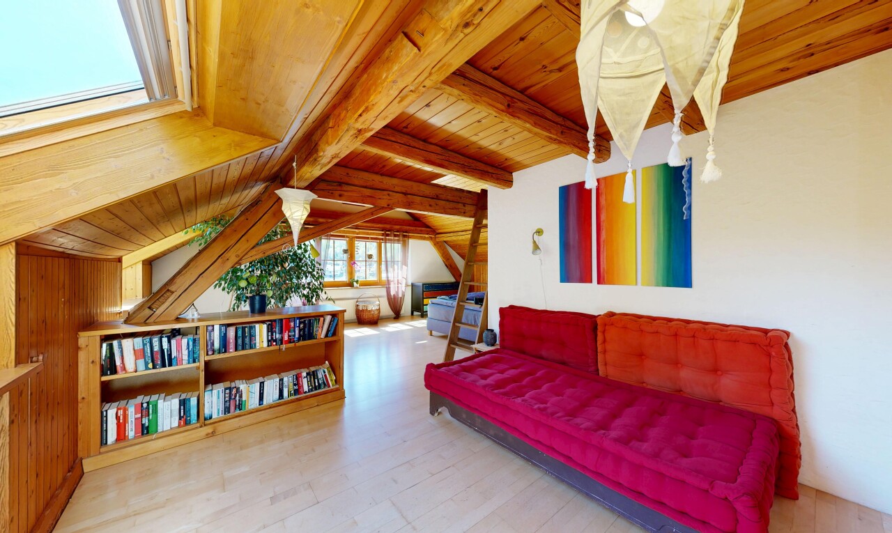 living room with a wood ceiling with exposed beams and light wood-style floors